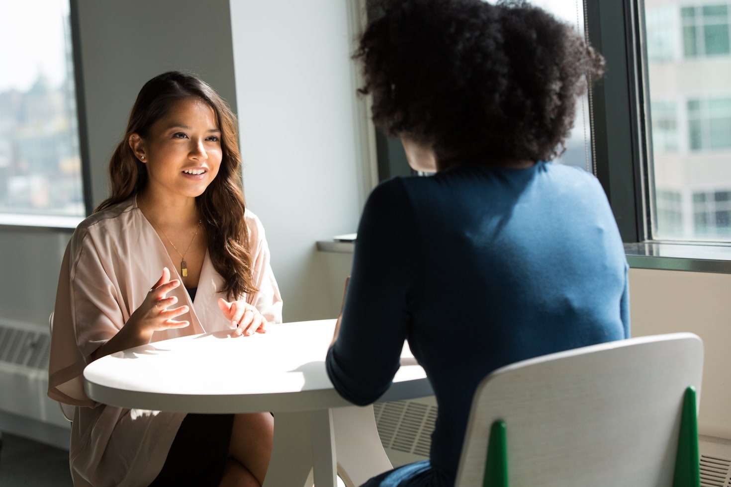 Social worker listening to client